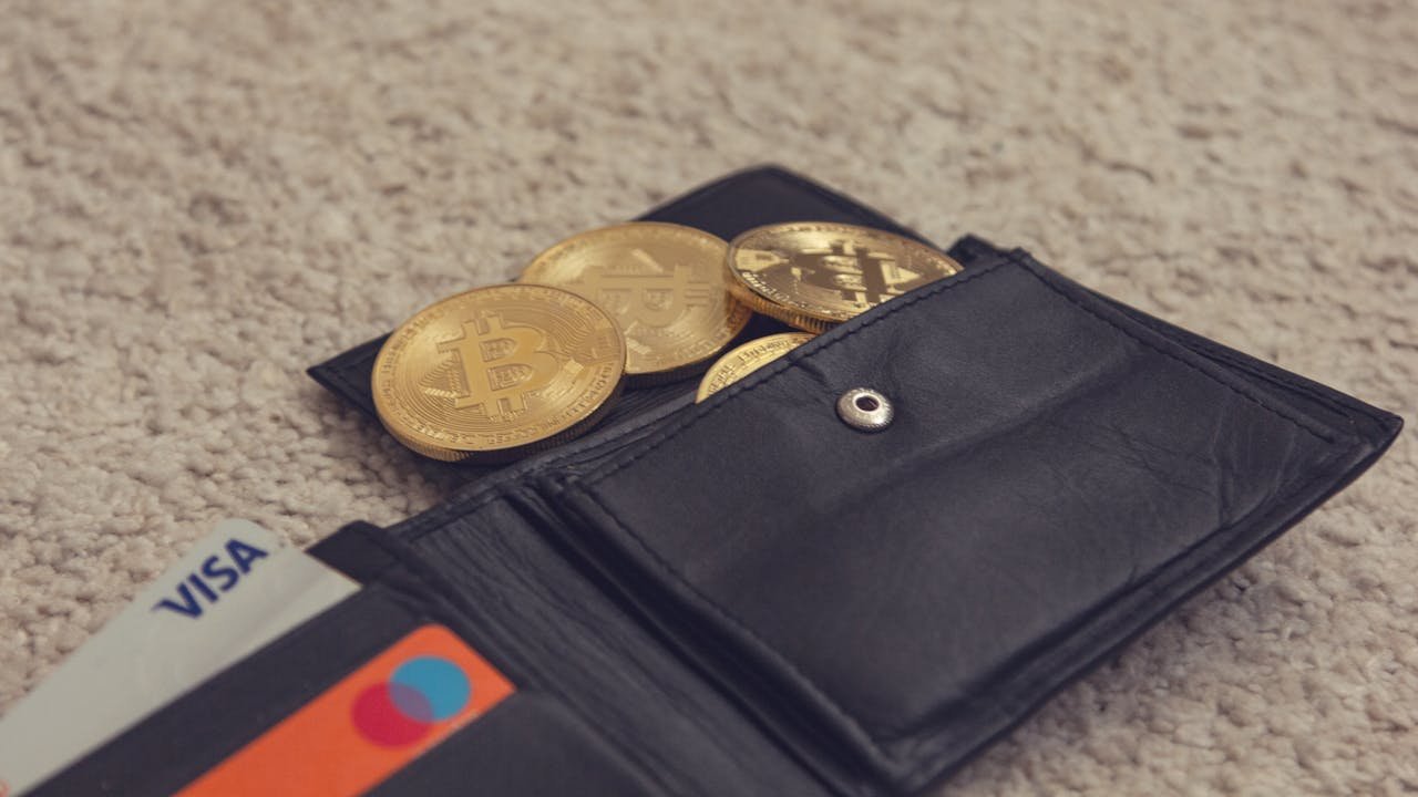 Black Leather Bifold Wallet With Gold Round Coins